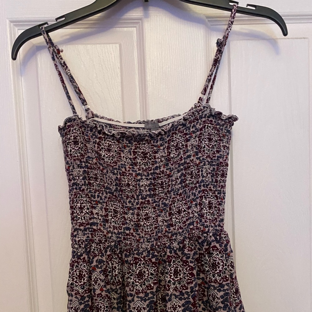Spaghetti strap tank top w/ floral pattern